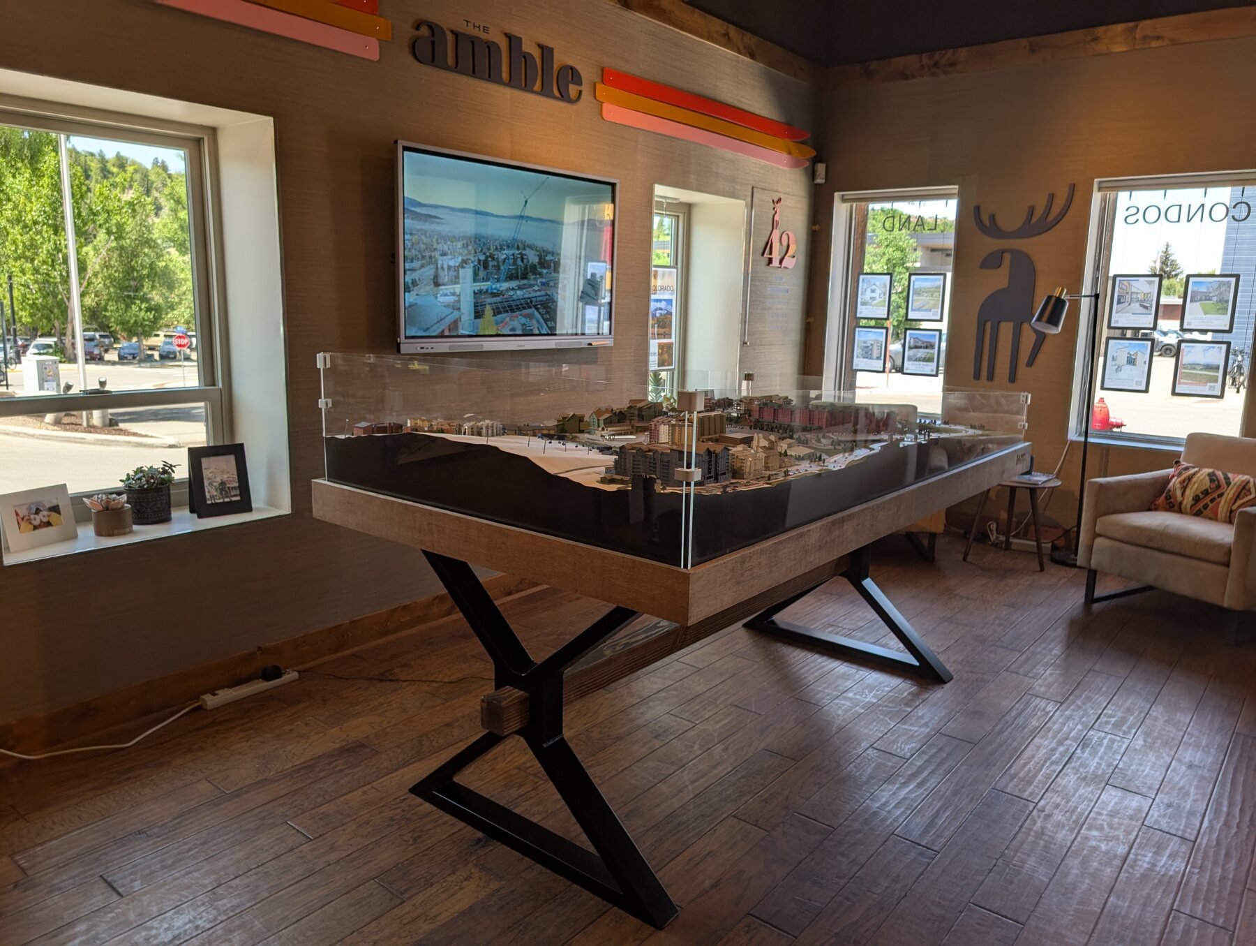 The Amble resort development model showing buildings and mountain terrain